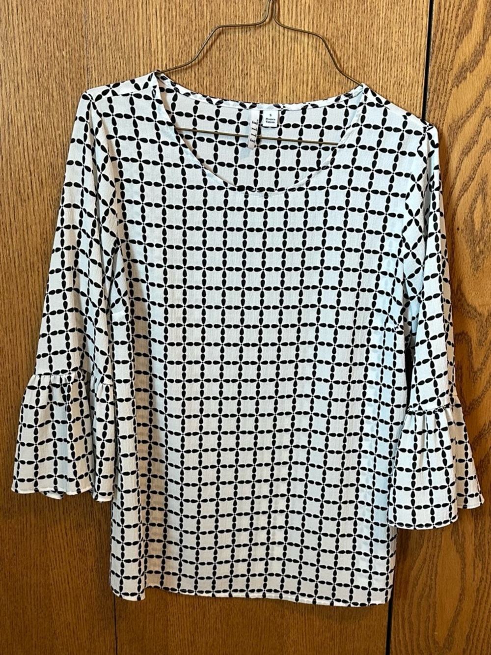 Elle White Top with Black Geometric Print and Ruffle Sleeves